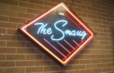 The neon Smaug sign